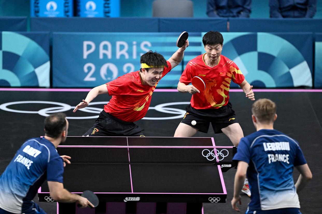 法国队险胜日本队,马龙高光表现 法国队险胜日本队,马龙高光表现